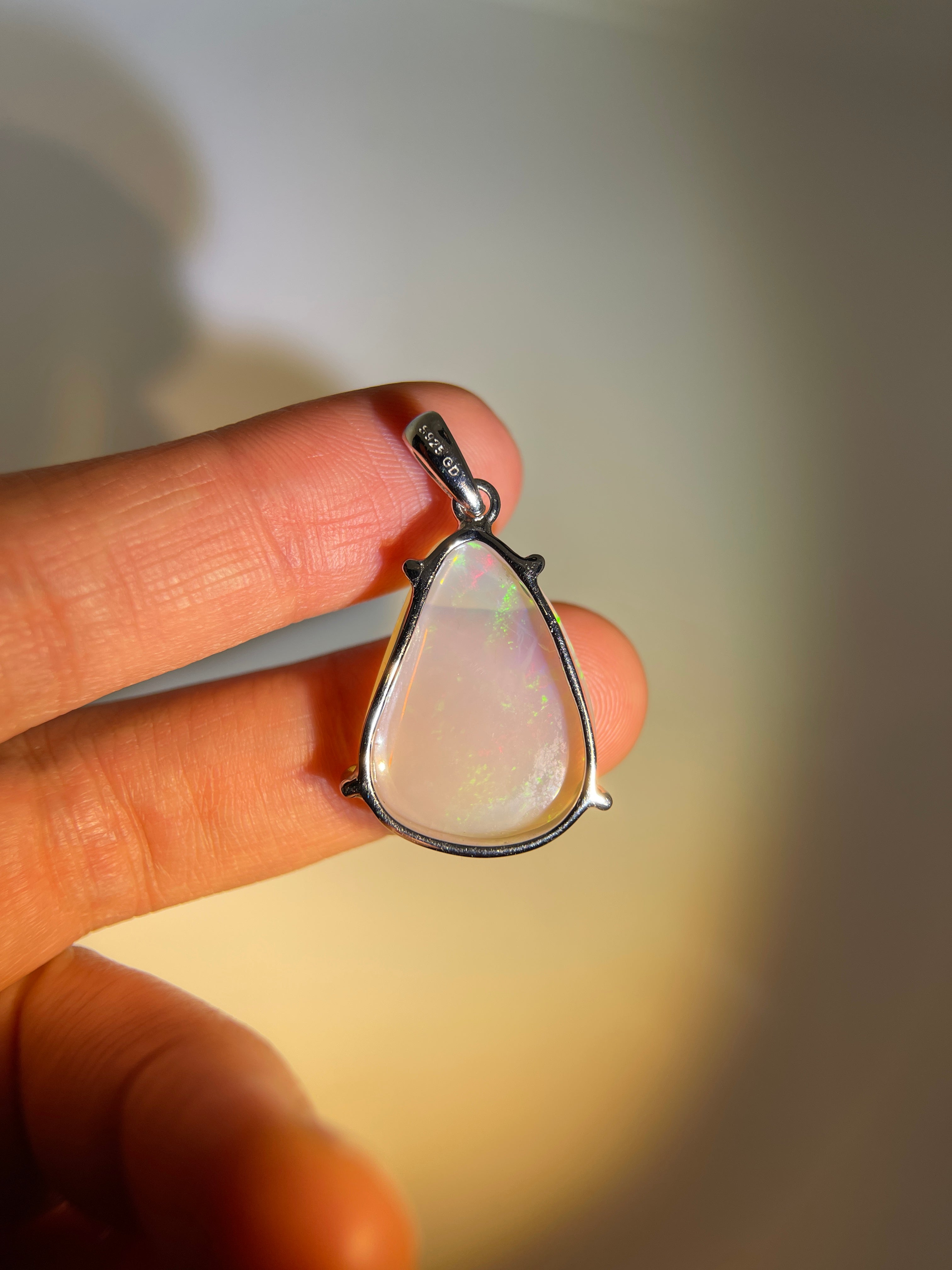 Solid white Opal s925 silver pendant
