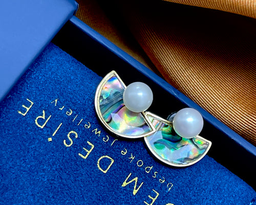 Round Freshwater Pearl set on semi-lunar Abalone Shell