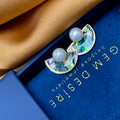 Round Freshwater Pearl set on semi-lunar Abalone Shell
