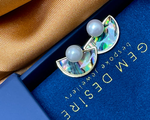 Round Freshwater Pearl set on semi-lunar Abalone Shell
