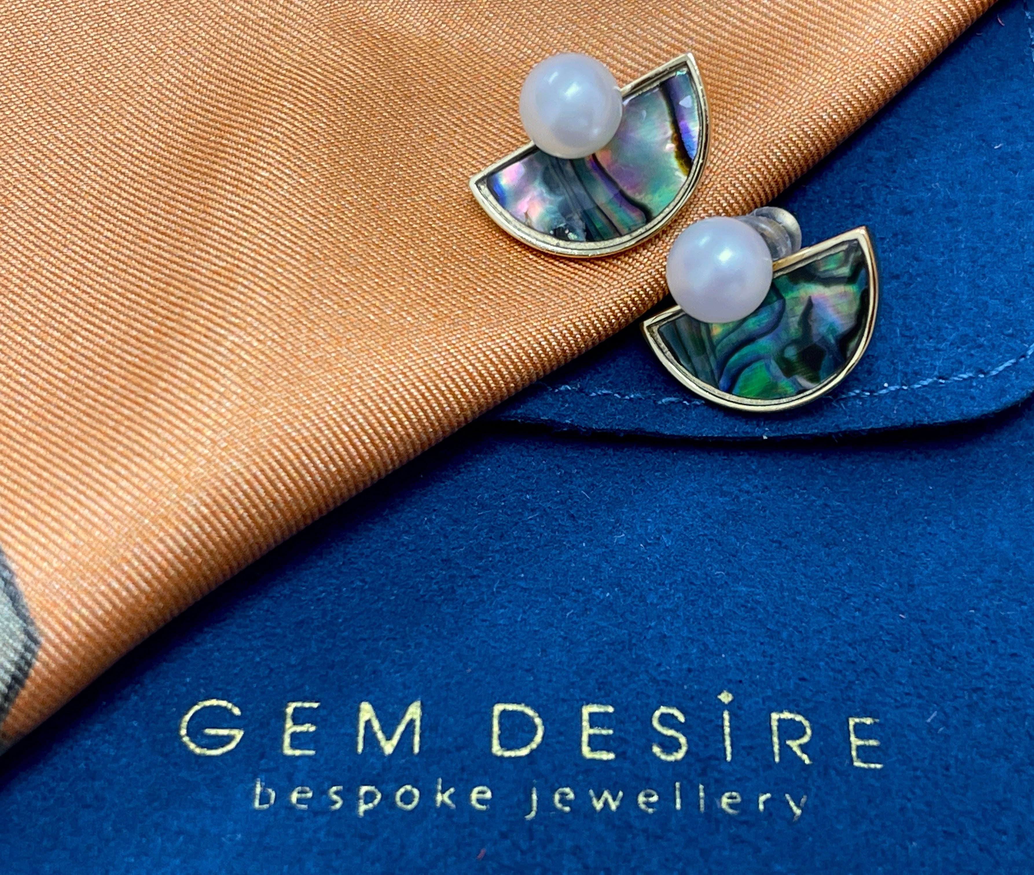 Round Freshwater Pearl set on semi-lunar Abalone Shell